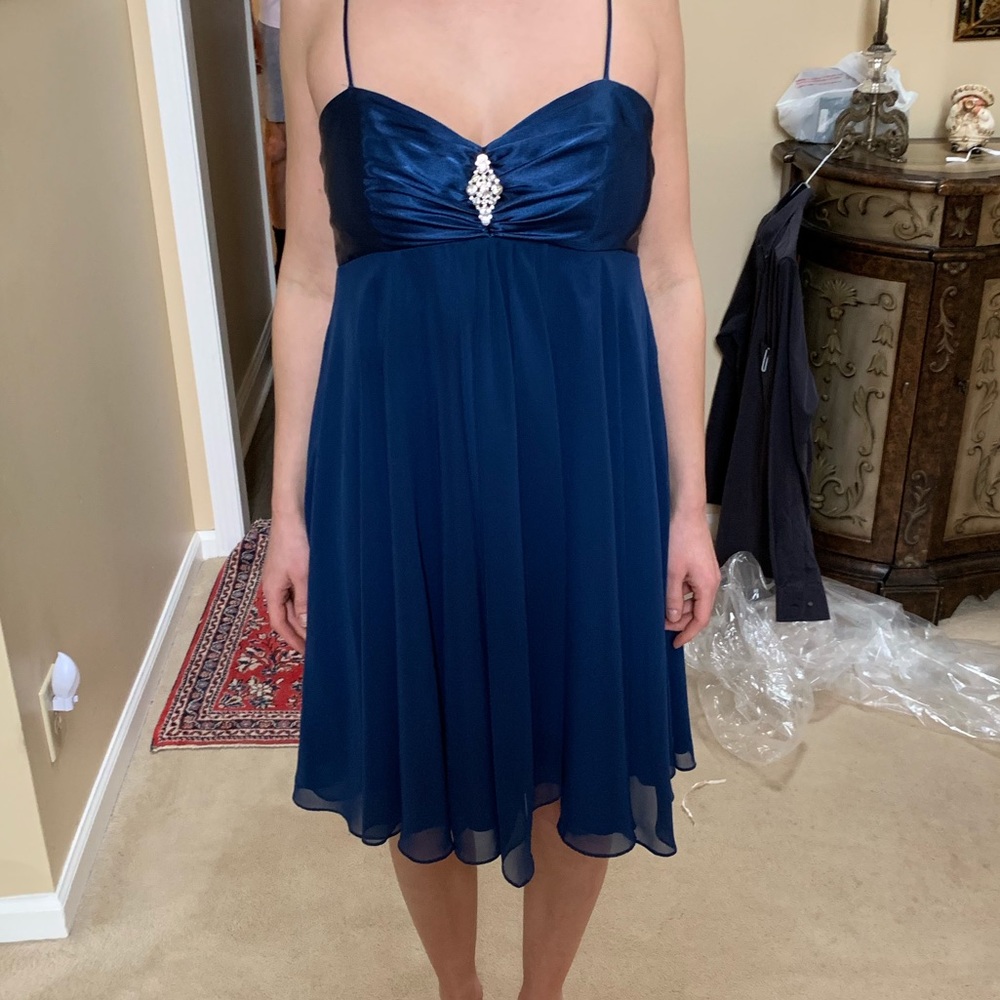 Blue David’s Bridal flare spaghetti strap dress